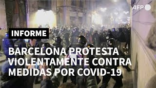 Manifestación contra restricciones por covid-19 degenera en disturbios en Barcelona | AFP