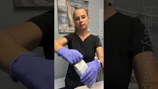 Professional lower leg wax using coral soft roll on wax heating system from Starpil