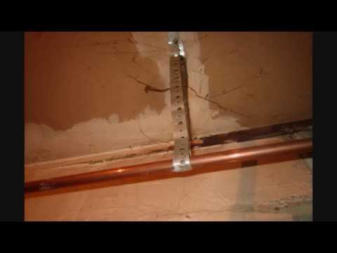 Supporting Pipes - Pipe Strapping Supporting Pipes - Pipe Strapping