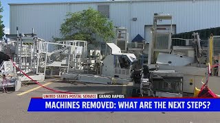 Dismantled sorting machines sit outside Grand Rapids USPS