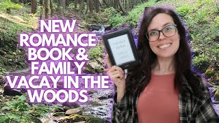Reading a New Romance Book During Family Vacation in the Woods