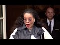 Very casual dressed RIHANNA exits her hotel in Paris