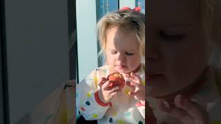 Cute Baby eating! Naomi peels and eats a tangerine