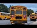 **8 minute special** school buses pulling to the highschool