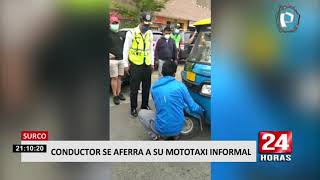 Surco: conductor se aferra a su mototaxi para evitar que fiscalizadores se la lleven