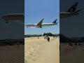 qatar b777 low landing over beach @ hkt phuket airport thailand