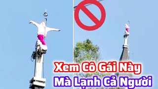 Rùng mình cô gái đứng trên nốc nhà cao chót vót xem mà lạnh người