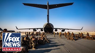 Media praises Afghanistan withdrawal, denies Americans are stranded