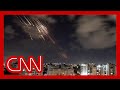 Iran fires missiles into Israel in response to deaths of Hezbollah leader & others. Watch CNN