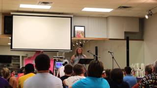 Claire Patterson speaking about Jesus at Young Life club