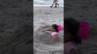 Taruni and Devansh playing in the beach