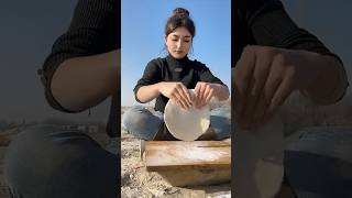 Village Life: Uyghur Girl Cooks Sand-Baked Kömech in Winter Shepherding