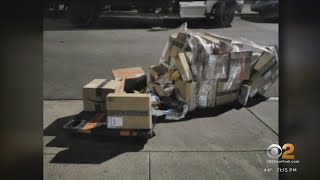 Packages stolen after being left outside Queens post office
