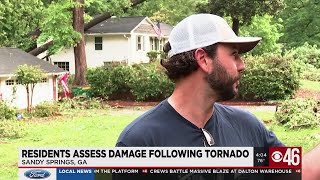 Residents assess damage after tornado