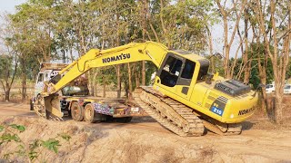 จังหวะเสียวๆ แบคโฮโคมัตสุไต่ขึ้นเทรลเลอร์ข้างคลอง KOMATSU Loading​