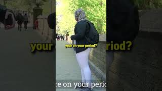 Woman helps girl on period by giving her pads