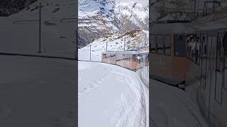 🇨🇭 As the Gornergrat train climbs higher into the Swiss Alps, a breathtaking winter wonderland.