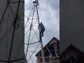 climbing a windmill