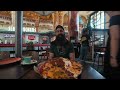 ATTEMPTING AN UNEXPECTEDLY SPICY NACHO MOUNTAIN CHALLENGE  BeardMeatsFood