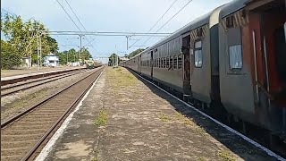 back to back non stop trains at tilaru railway station in evening