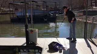 Installing a Dock Lifeguard on a dock with electricity not connected yet.