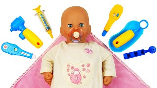 Baby Annabell doll is ill. Baby dolls' check-up in a hospital. Baby born doll feeding & role play.