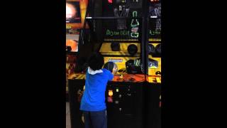 Karsten playing basketball arcade with his dad. Great shooting!