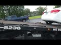How to load car No keys stuck in neutral On roll back flat bed, tow truck. Walk a roll back?