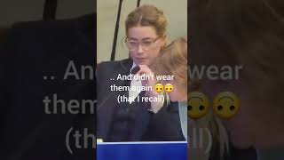 Amber Heard Putting on Glasses She Doesn't Need