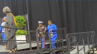 Jacksonville mother walks stage to accept son's diploma after he was shot to death