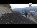 Kosovo Serbs set up new road blocks as clashes with NATO continue