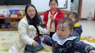 Father and daughters eat a big meal, but mother and son eat noodles at home