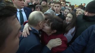 Putin hugged, kissed by supporters as he visits southern Russia