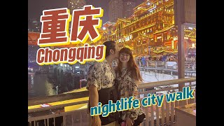 After visitting Chongqing for a whole day, she was deeply fascinated by the night view of Chongqing.