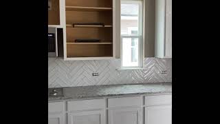 Herringbone style kitchen backsplash mikis tile