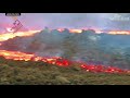 fast flowing river of lava pours from la palma volcano in canary islands