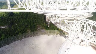 Aerial views of Arecibo Observatory damages after cable snaps