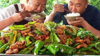 Stir-fried pork with 1.5 kilos chillis. Nice and spicy!