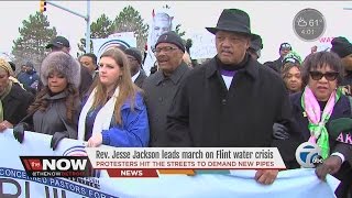 Reverend Jesse Jackson leads march on Flint water crisis