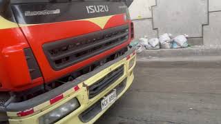 Light Dark Orange and Light Yellow Isuzu GigaMax Smoother-G Wing Van Truck in Gregorio Araneta Ave.