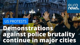 US protesters defy curfew: Demonstrations against police brutality continue in major cities