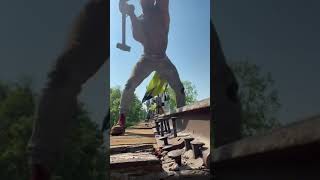 hunk construction worker pounding it