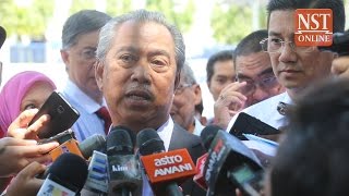 Muhyiddin emerges from police questioning, reasserts right to speak on 1MDB