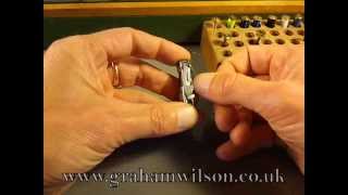 Inserting the bobbin into the shuttle and threading it correctly