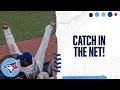 Vladimir Guerrero Jr. makes an incredible over-the-shoulder catch in to the netting!