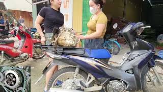 Girl repairs and restores owl motorbike