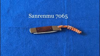 Sanrenmu 7065 … sencilla y barata perfecta como navaja edc.