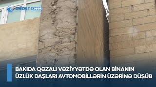 Bakıda qəzalı vəziyyətdə olan binanın üzlük daşları avtomobillərin üzərinə düşüb