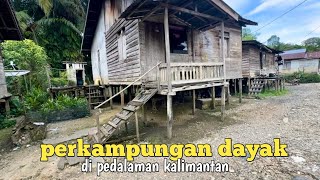 Suasana tenang perkampungan suku dayak kanayatn di tepi sungai landak