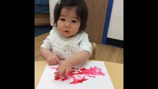 Infant Finger Painting at Apple Montessori